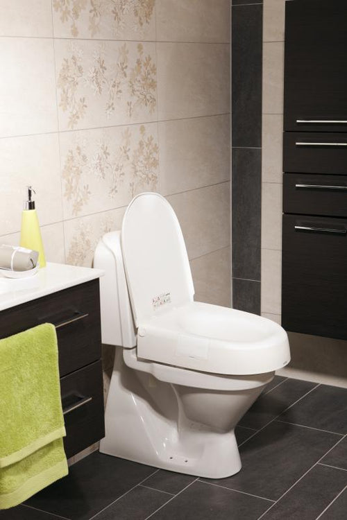 Etac CLoo toiletverhoger - in hoogte verstelbaar + armleuningen